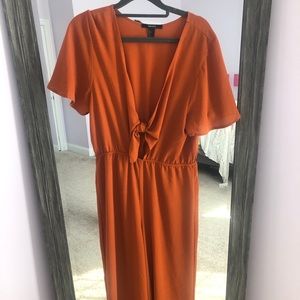Orange jumpsuit with tied front